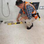 CASp Inspector reviewing floor slope.